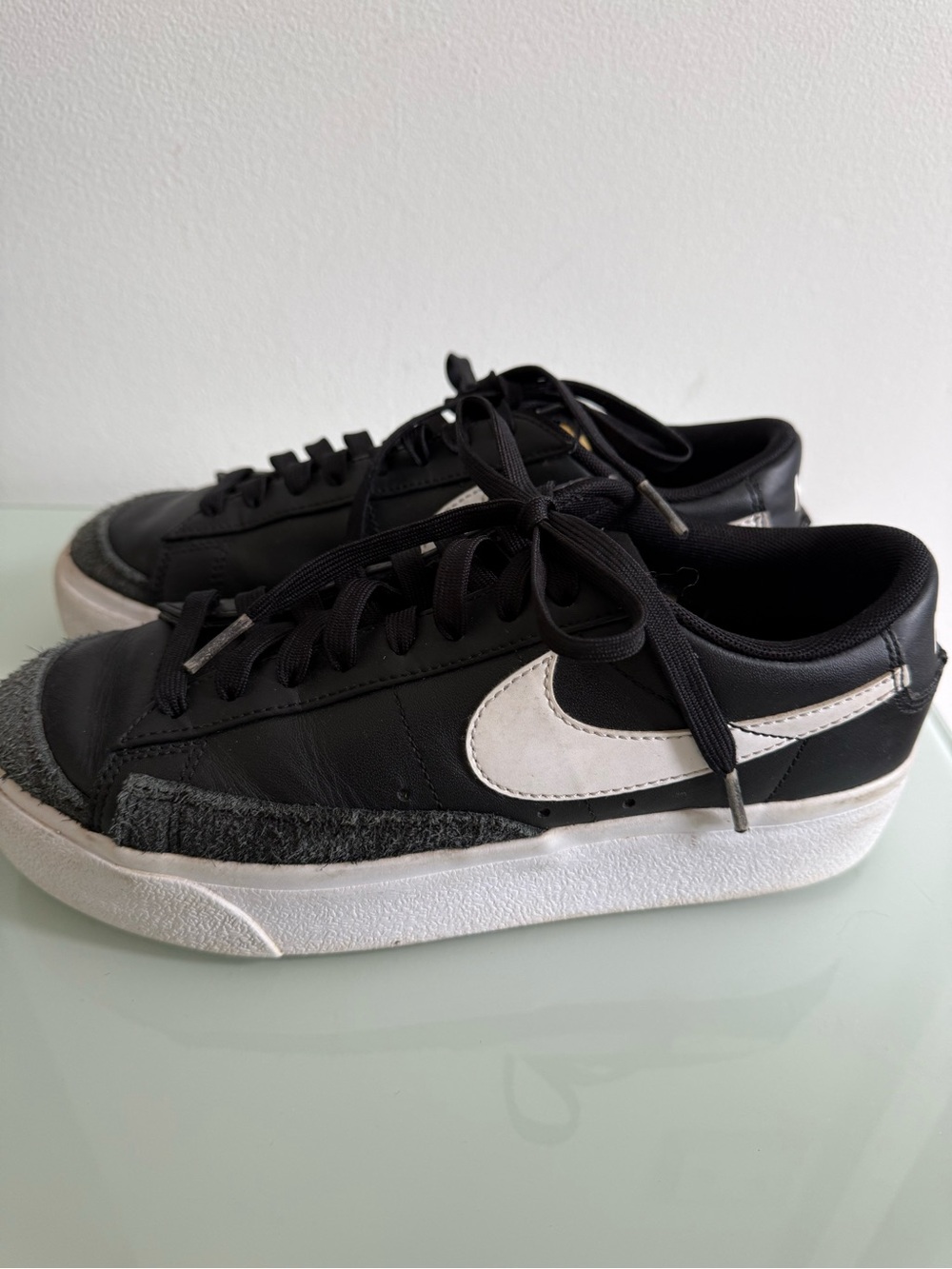Nike Black Sneakers with White Swoosh and Gray Accents